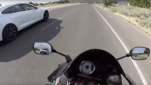 Motorcycle Vs Tesla