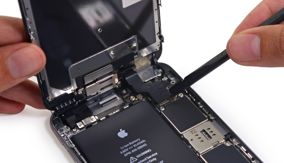 iPhone 6s Plus teardown: Rear camera modules can be observed near the top right side of the phone.