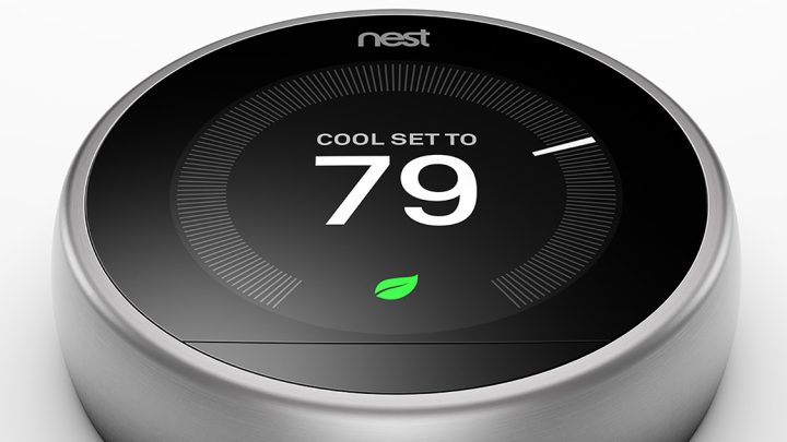 Nest Learning Thermostat on a white background