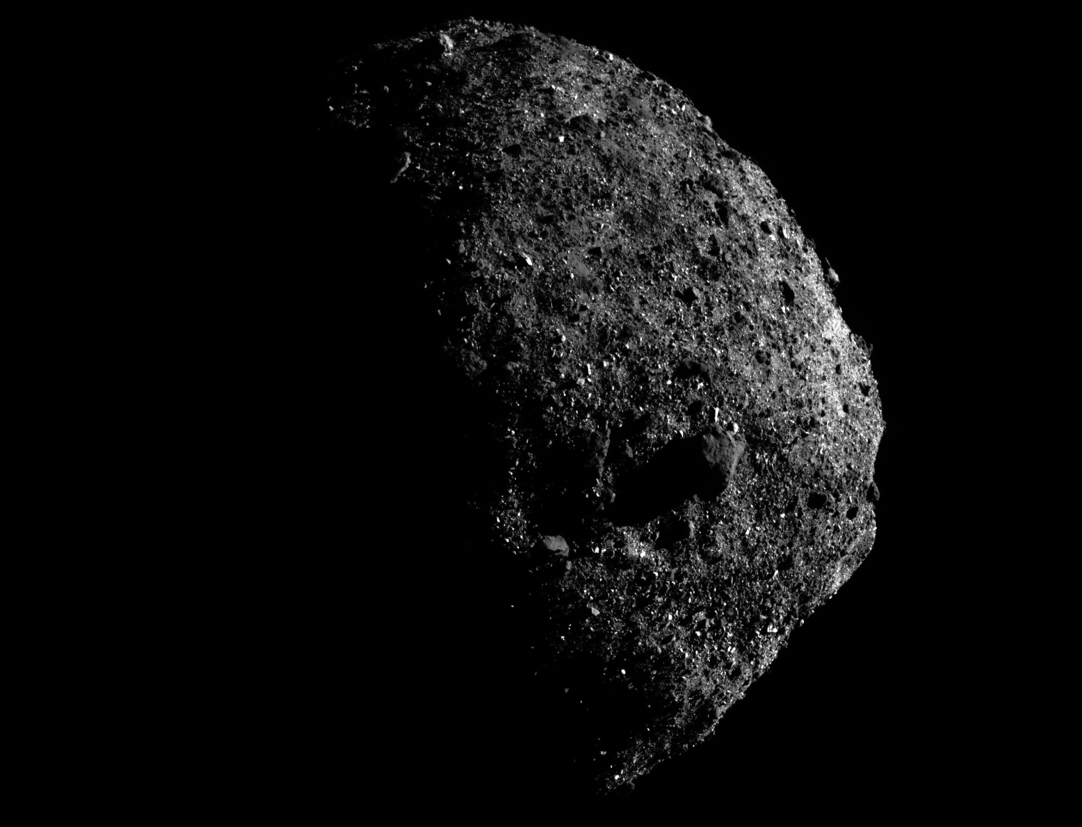 Scientists spot hints of flowing water on asteroid’s surface thumbnail