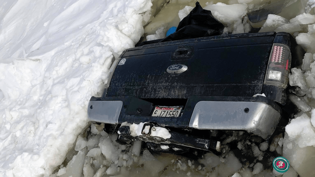 truck falls through ice