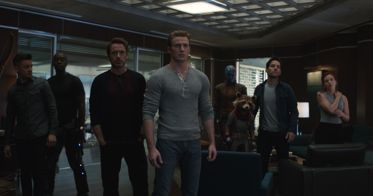 Screenshot from Avengers: Endgame showing the Avengers team planning the daring mission to retrieve the Infinity Stones from the past.