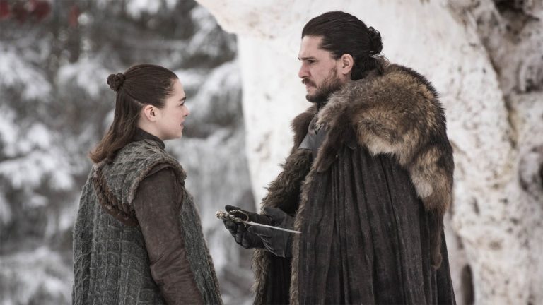 Maisie Williams as Arya Stark and Kit Harington as Jon Snow in Game of Thrones.