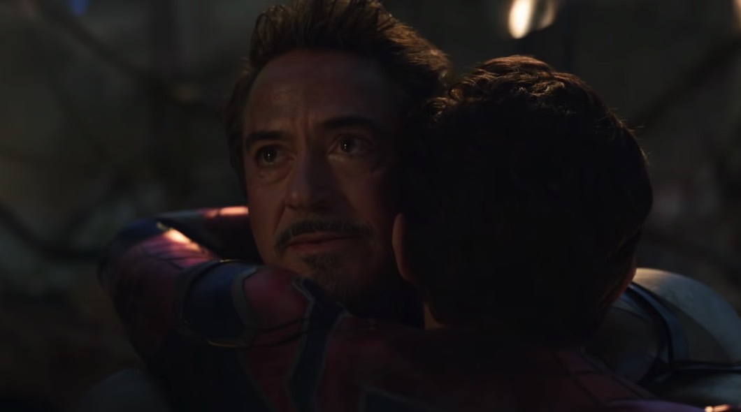 Iron Man embracing Spider-Man