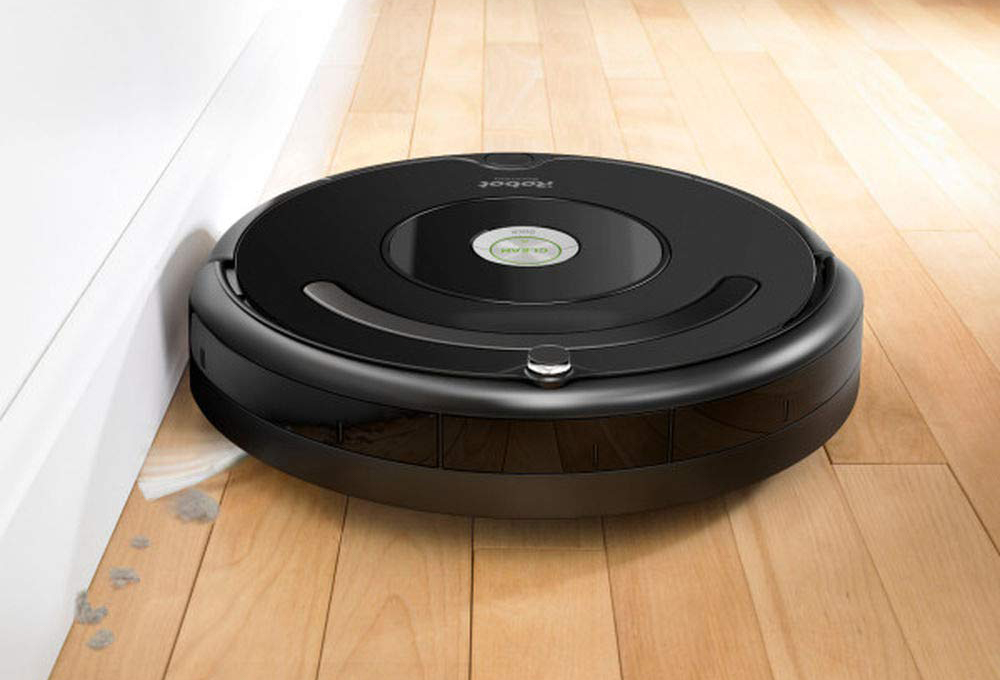 roomba picture of woman on toilet