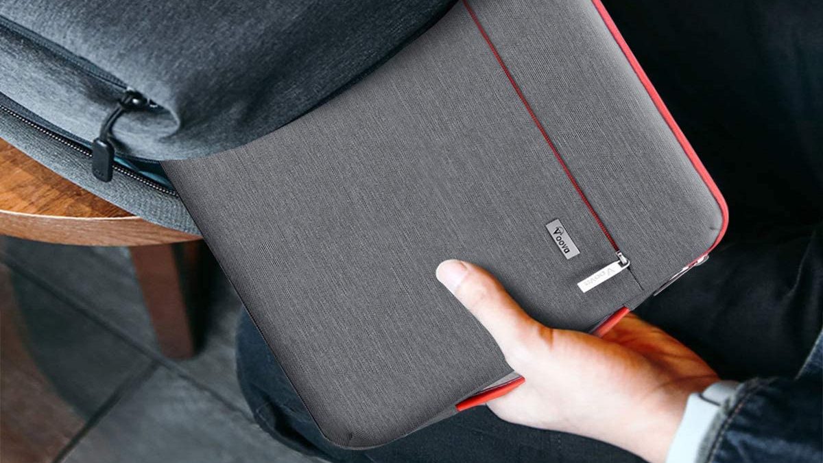 Putting a laptop case in a bag