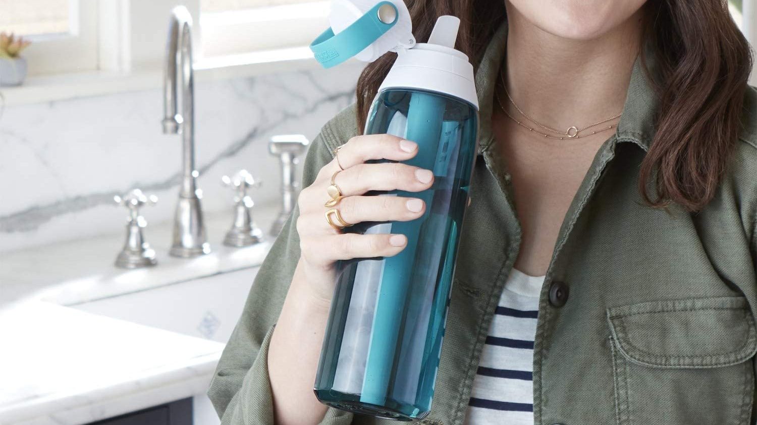 Woman holding a bottle