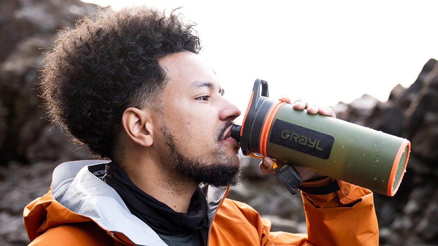 A man sipping water