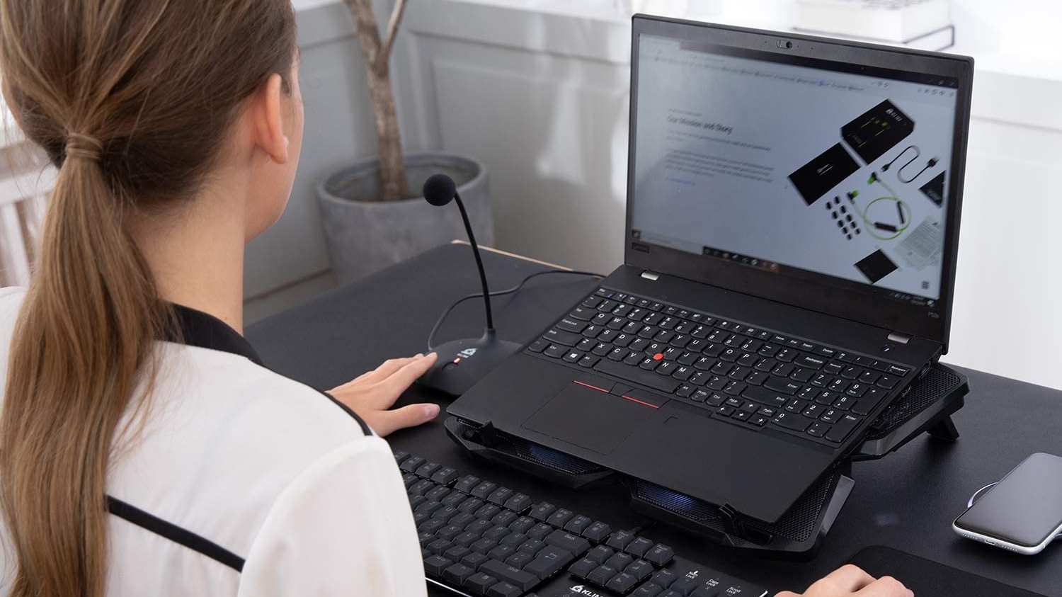 A laptop with a cooling pad