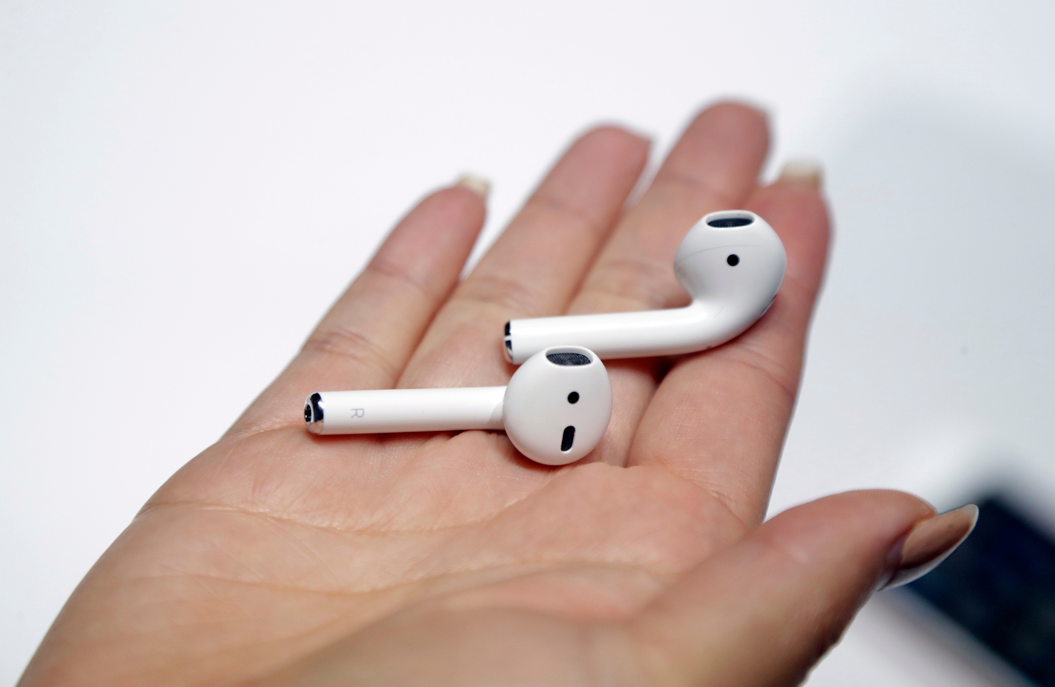 Apple unveils new AirPods features, including the ability to seamlessly