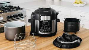 The Ninja Foodi FD401 multi-use cooker with built-in air frying