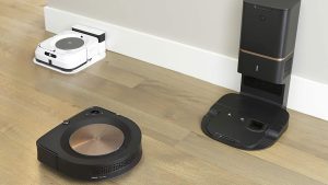 The iRobot Roomba S9+ next to a Braava Jet robot mop