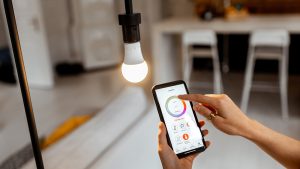 Smart LED Light Bulb being controlled by a smartphone