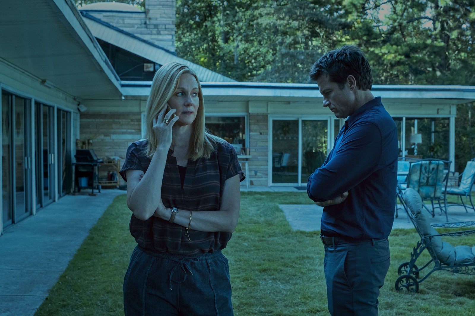 laura linney stands beside jason bateman