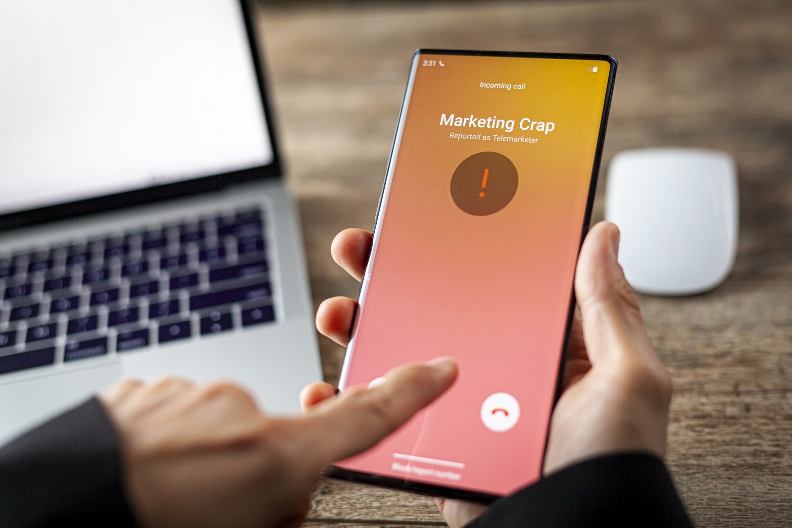 Concept image showing an office setting where a professional is receiving an unwanted robocall on her phone. The network provider detect the scam and put marketing crap notice. woman rejects the call.