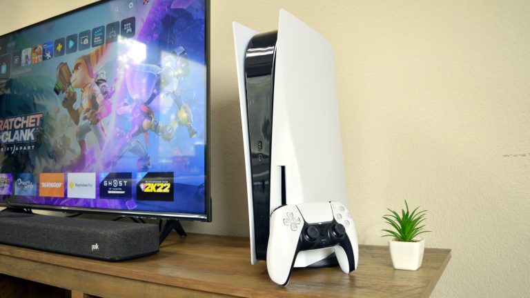 Sony PS5 video game console next to a smart TV