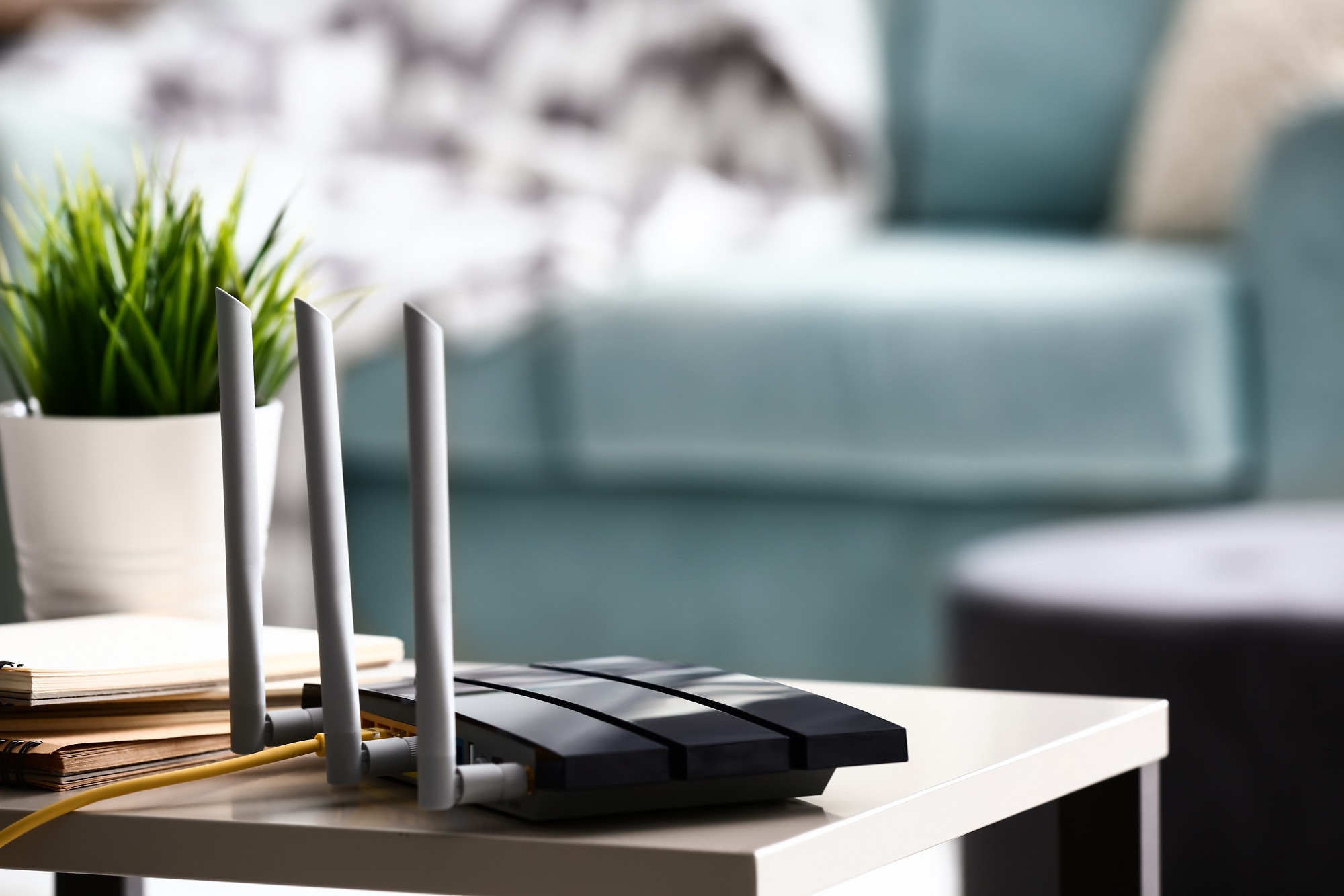 Modern WiFi router on a table.