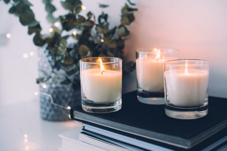 Lighted candles in jars.