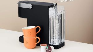 A Keurig and its water reservoir