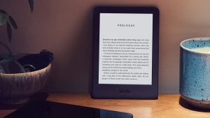 A Kindle against a wall