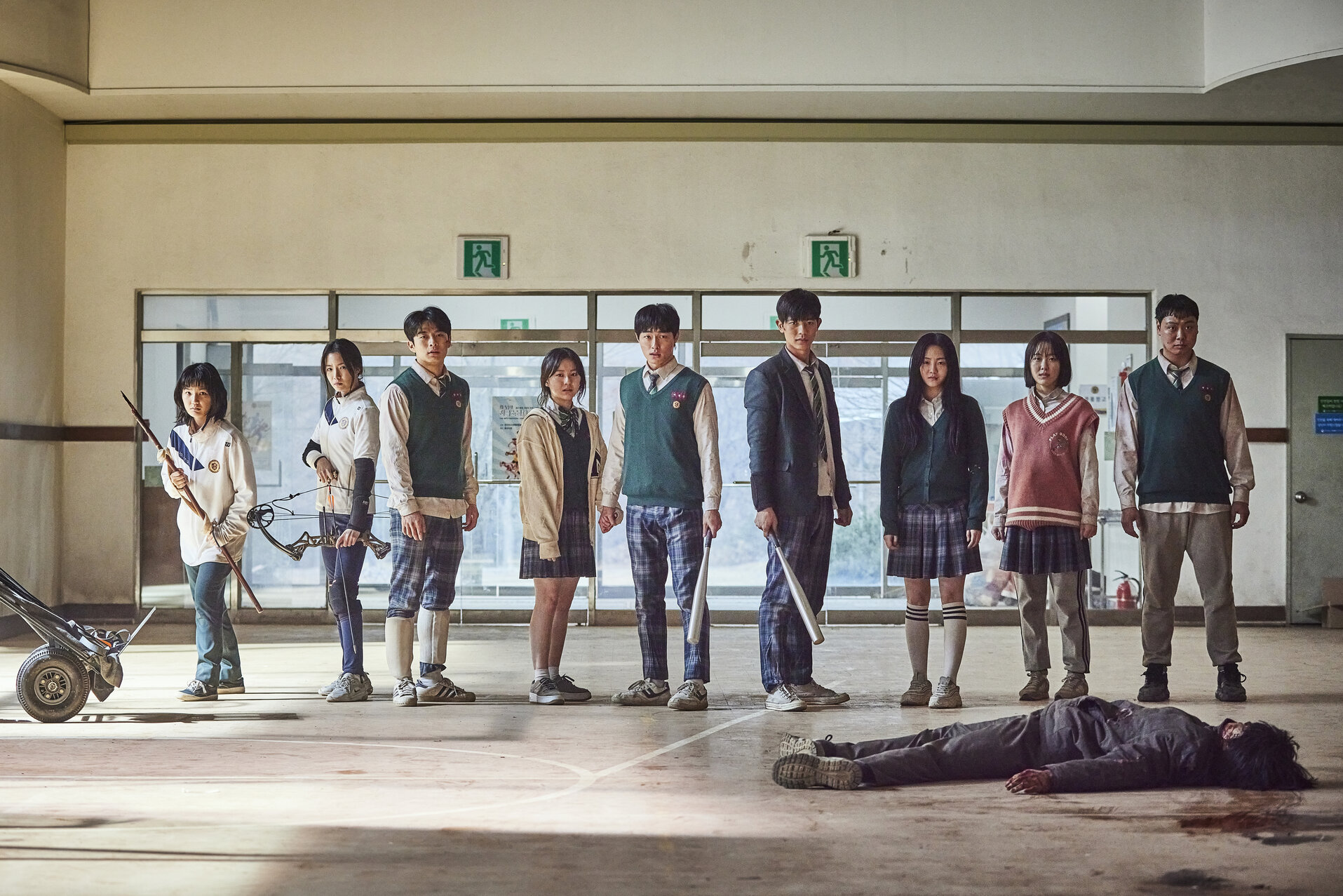 High school students standing in line over a dead body