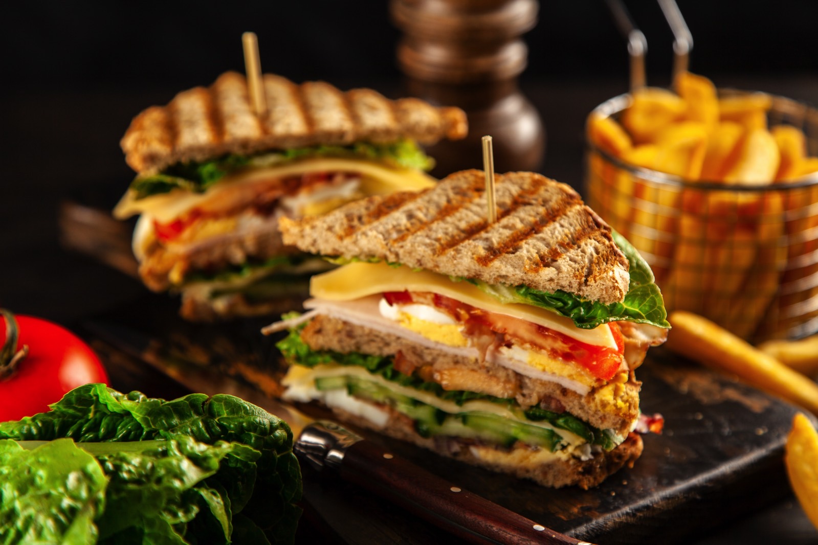 Sandwiches on a plate and french fries