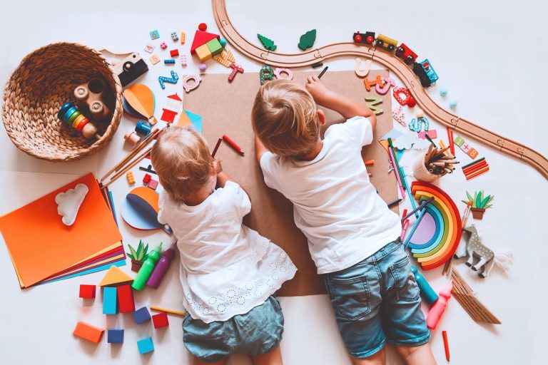 Children playing with toys on the floor