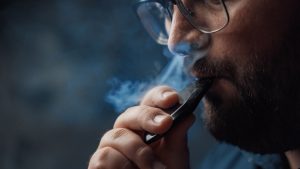 how vaping affects the brain Man smokes new Vape Pod System