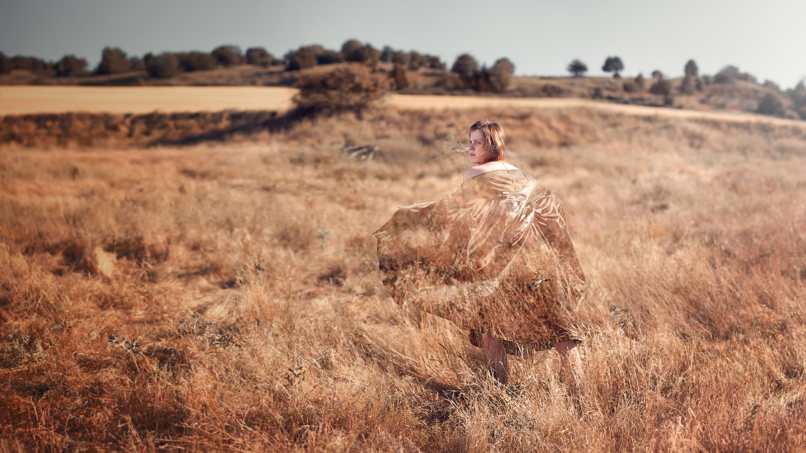 woman using invisibility cloak