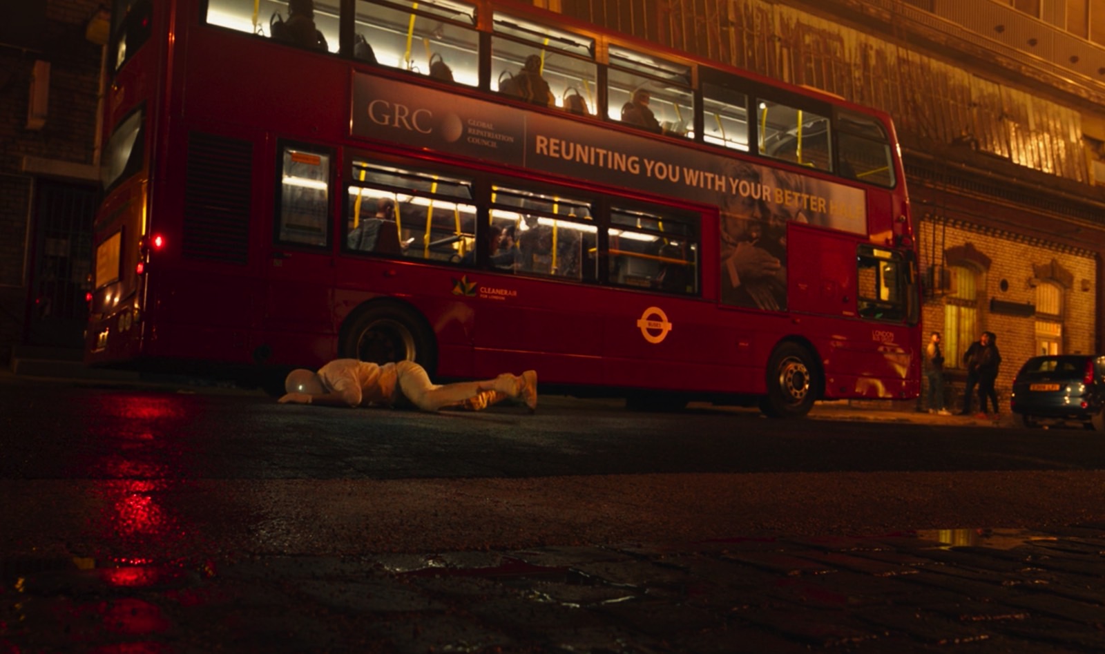 Mr. Knight in front of a bus