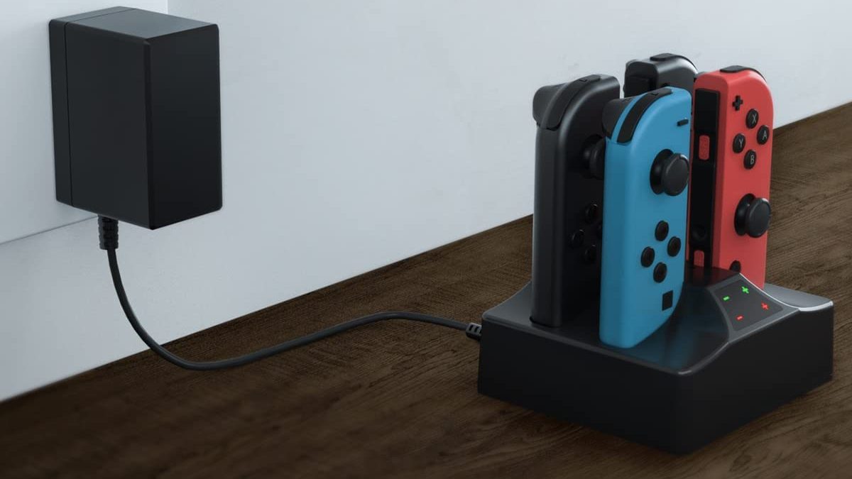 A charger charging Nintendo Switch controllers