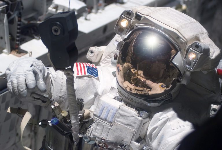 ISS astronaut in spacesuit