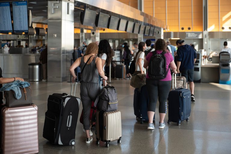 memorial day travel airport passenger line