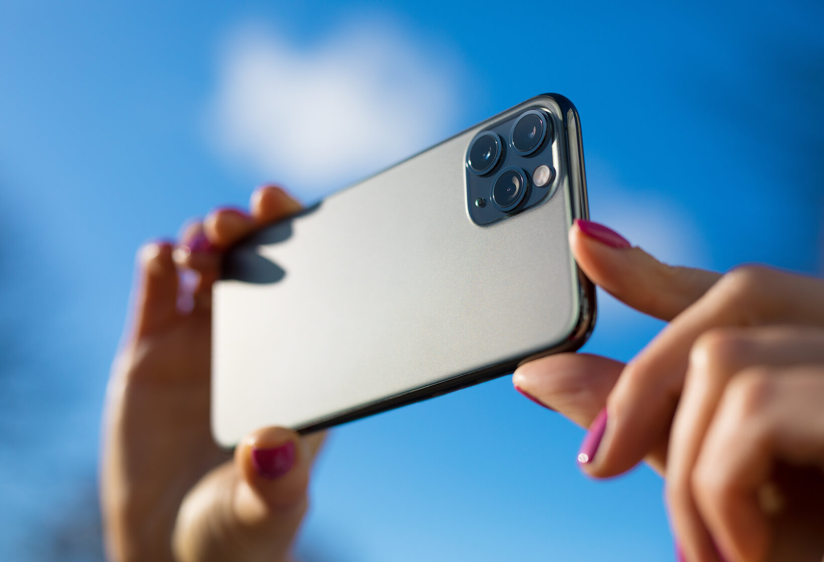 closeup of hands holding smartphone