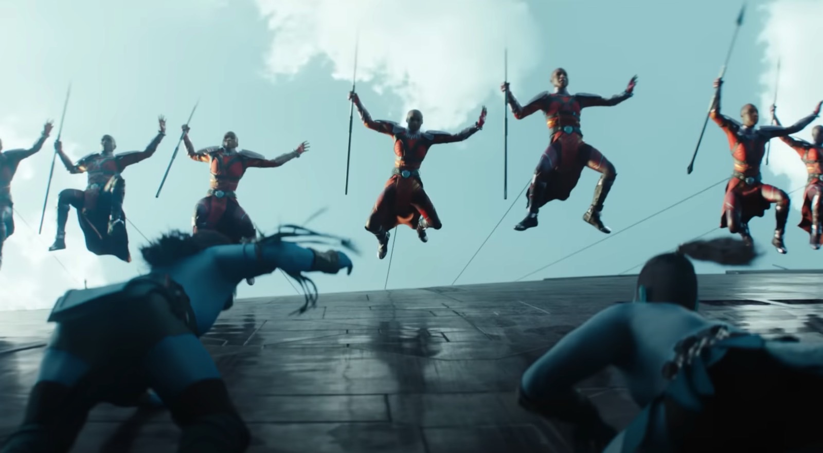 The Dora Milaje fighting the Talokan at sea in Wakanda Forever trailer.