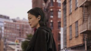 A person using the Google Pixel Buds Pro wireless earphones.