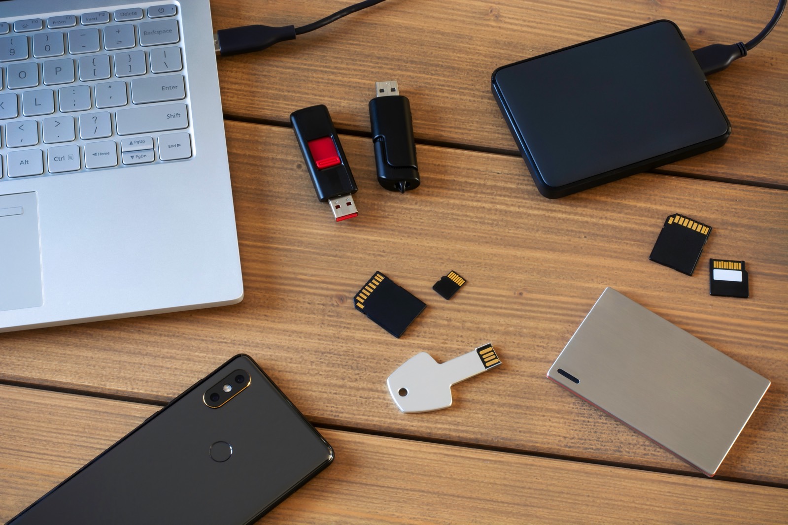 Various digital data storage devices. Usb sticks, external hard drive, SD cards, mini and micro SD cards, laptop and smartphone