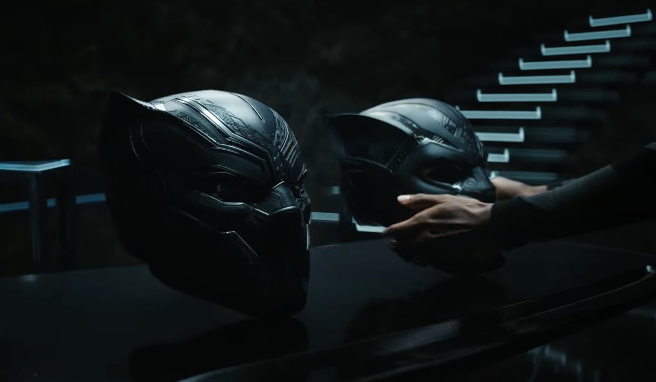 A person picking one of two Black Panther armor in new Wakanda Forever promo.