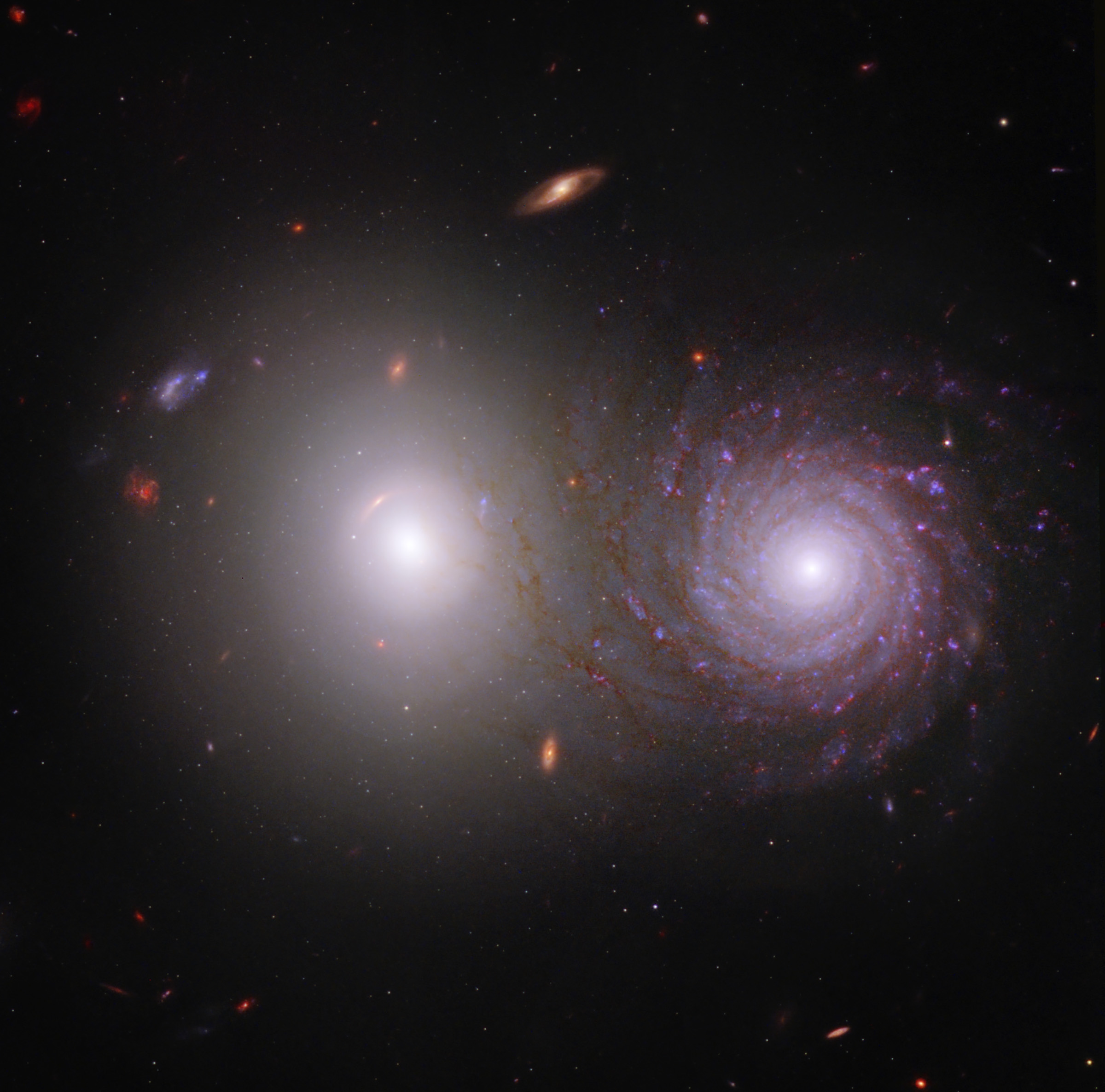 galactic pair showcasing james webb and hubble team-up