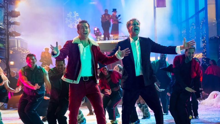 Ryan Reynolds and Will Ferrell in Spirited on Apple TV+.