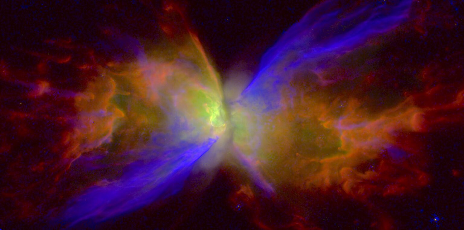 colorized image of butterfly nebula created from hubble observations