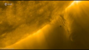 a youtube still from video of Mercury transiting the Sun