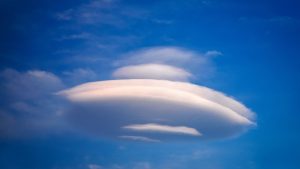 UFO-shaped cloud in sky
