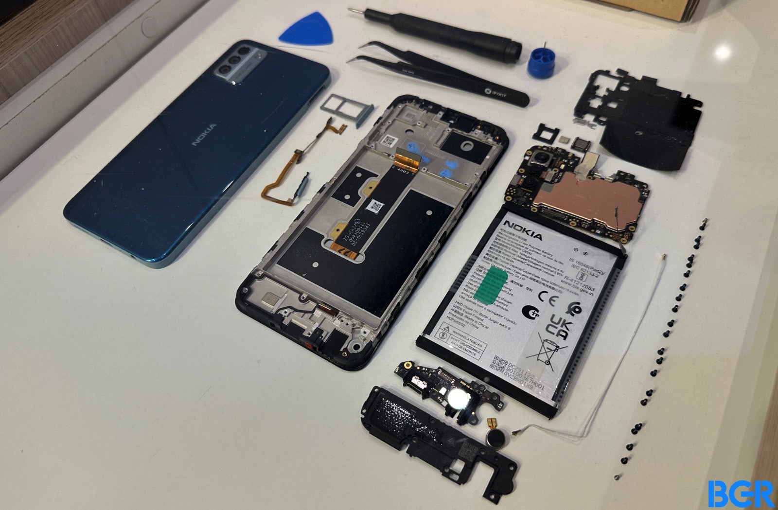 A dismantled Nokia G22 smartphone.