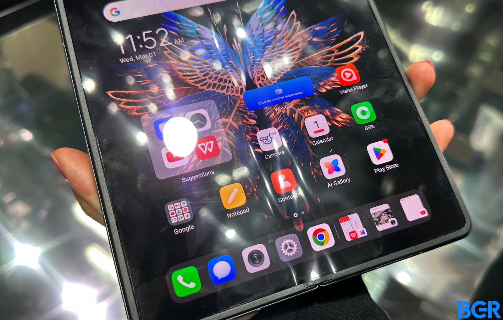 The foldable phone's crease is still visible.