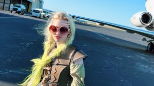 Grimes at an airport