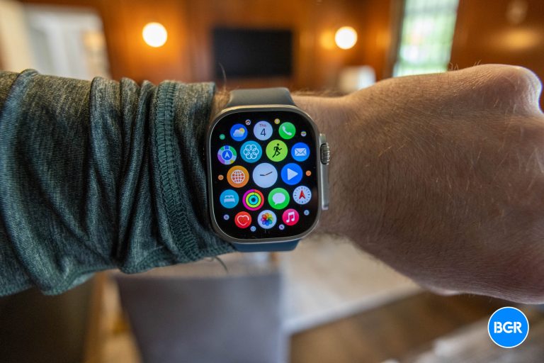 Apple Watch Ultra on a wrist showing app icons