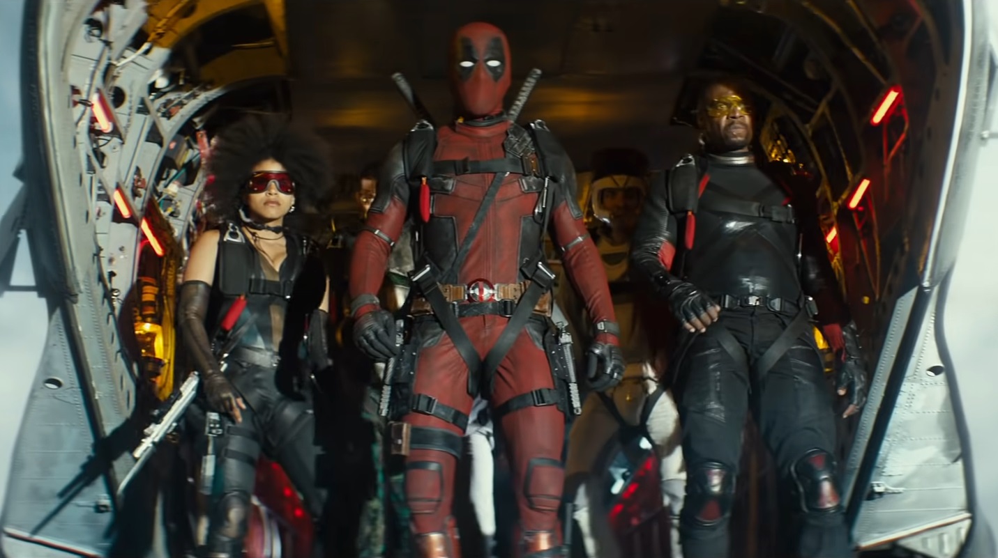 Zazie Beetz, Ryan Reynolds, and Terry Crews in Deadpool 2.