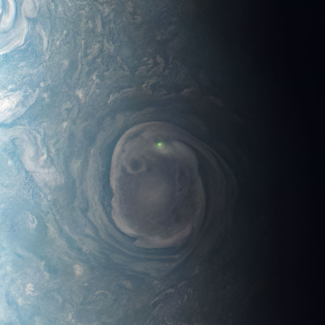 green orb on Jupiter, captured by Juno
