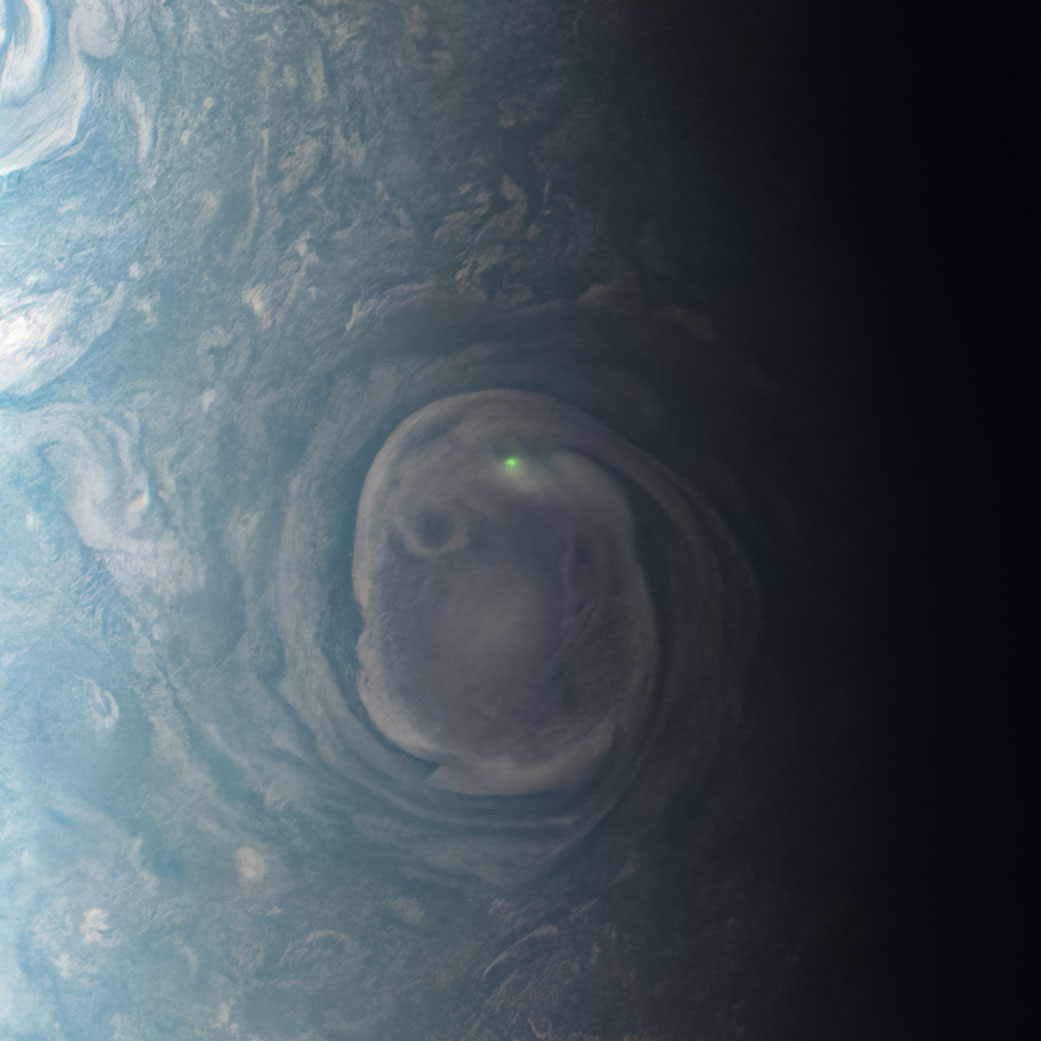 green orb on Jupiter, captured by Juno